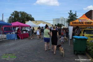 People Walking the Street at Pints n' Paws in Sanford