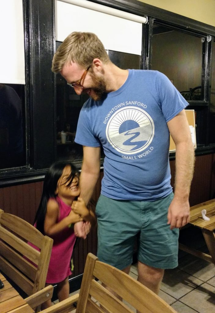 Jeremy with Junichi's daughter at Jimott's Restaurant in Sanford