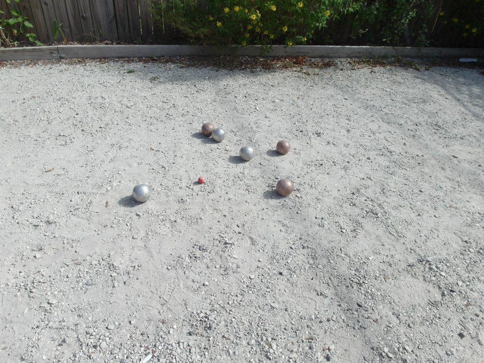 Petanque boules on a pitch